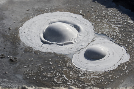 Iceland geothermal. Namafjall - area in field of Hverir. Landscape which pools of boiling mud and hot springs. Tourist and natural attractionsの写真素材