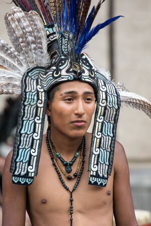 Mexico City, Mexico - April 30, 2017. Aztec dancers dancing in Zocalo square
