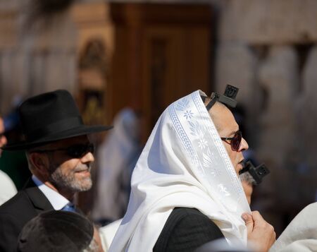 JERUSALEM, ISRAEL - Feb 18, 2013: Bar Mitzvah ritual at the Wailing wall in Jerusalem. A 13 years...