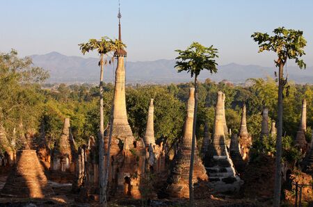 Shwe Inn Thein Paya, Indein, Nyaungshwe , Inle Lake,Shan state, myanmar Burma . Weather-beaten buddhistic zedi constructed in 17th and 18th century damaged by earthquake in 1975の写真素材