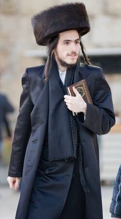 JERUSALEM, ISRAEL - Feb 18, 2013: Bar Mitzvah ritual at the Wailing wall in Jerusalem. A 13 years...