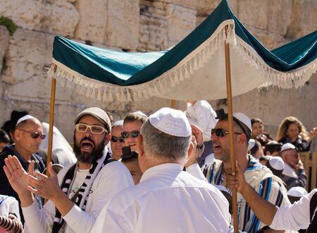 JERUSALEM, ISRAEL - Feb 18, 2013: Bar Mitzvah ritual at the Wailing wall in Jerusalem. A 13 years...