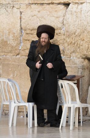 JERUSALEM, ISRAEL - Feb 18, 2013: Bar Mitzvah ritual at the Wailing wall in Jerusalem. A 13 years...