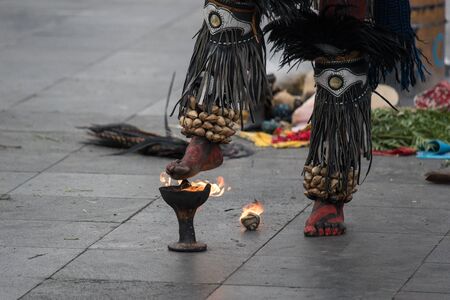 Mexico City, Mexico - April 30, 2017: Aztec dancers dancing in Zocalo square