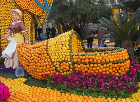 MENTON, FRANCE - FEB 27,2012: Lemon Festival on French Riviera. Architectural composition and huge edible figures made from juicy lemons and orangesのeditorial素材
