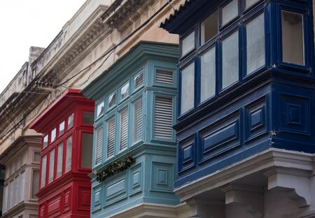 Famous colorful wooden balconies in narrow streets of Malta, Valleta. Architectural Maltese feature of of the island.の写真素材