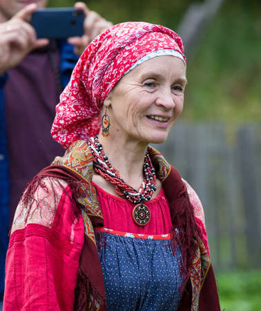 Torzhok, Russia -August 15, 2020: Historical interpreters reconstruction in european medieval costume.Portrait of a woman in an old historical dress.のeditorial素材