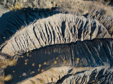 Fancy and unusual autumn aerial landscape of Romantsev mountains wih blue lakes, yellow trees and...