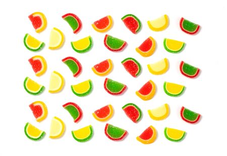 Pattern with lemon shape jelly candy on isolated backgroundの写真素材
