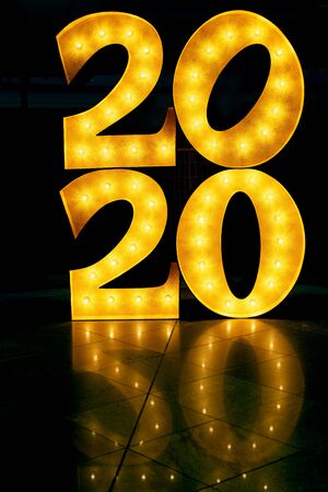 Happy New Year 2020. Number 2020 lights on the floor. Beautiful overlay template for Happy New Year greeting card.の写真素材