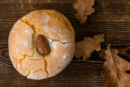 Gluten free italian cookies and autumn dry oak leaves. Retro style. Almond cookies. Sicilian...