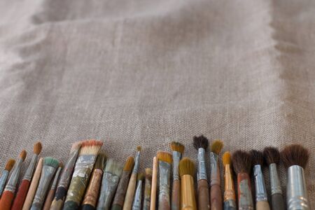 blurred flax background with a lot of different brushes on it place for your text