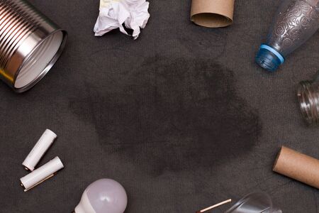 a lot of trash on a black background for recycling care about nature copy spaceの写真素材