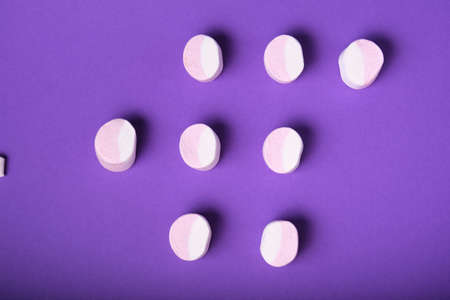 pattern of marshmallows on a purple backgroundの写真素材