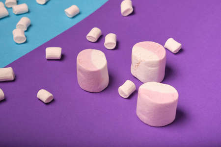 different types of marshmallows with different flavors on a bright colored background