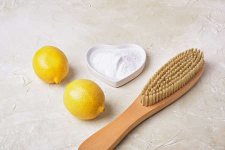 soda, lemons, sponge and wooden brush for eco cleaning, natural and non-toxic detergents, zero waste lifestyle conceptの写真素材