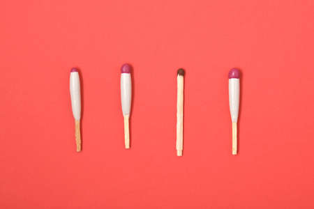 waterproof matches and simple match on red background top viewの写真素材