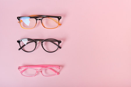 several different glasses on a pink background copy space top viewの写真素材