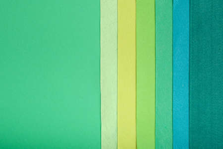 textured geometric background of felt several shades of green, mock up