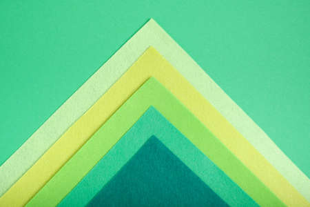 textured geometric background of felt several shades of green, mock upの写真素材