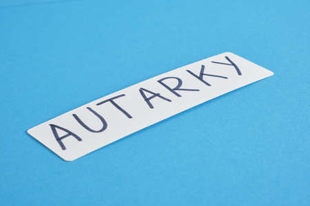 The word of phrase - autarky concept inscription author on a blue background