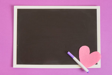 black board and chalk markers for drawing mockup top view front copy spaceの写真素材