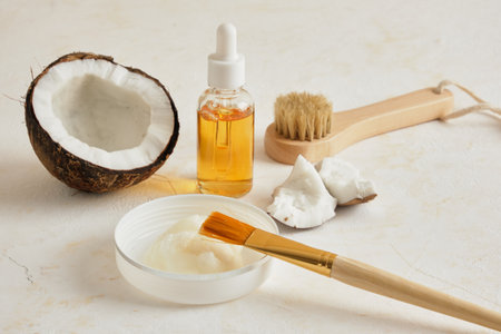 cosmetic face mask and Natural organic coconut oil or serum in amber glass dropper bottle, natural...