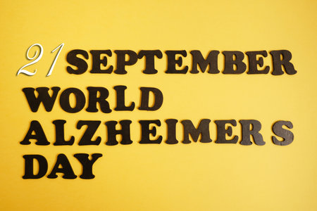 chalk board with description September 21 Alzheimer's day, brain disease conceptの写真素材