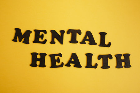 psychological health concept, inscription on yellow backgroundの写真素材