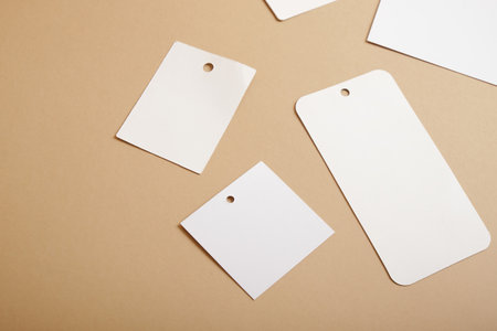 Blank tags on brown background,の写真素材