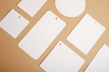 Blank tags on brown background,の写真素材