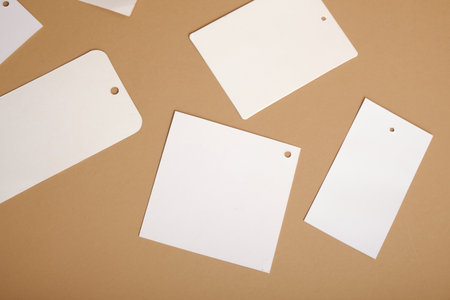 Blank tags on brown background,の写真素材