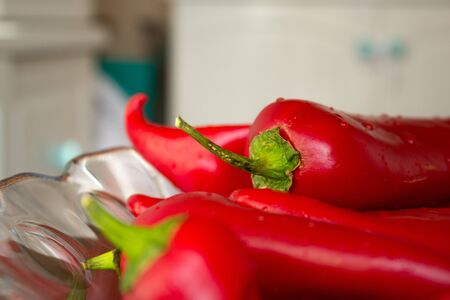 red peppers with green sproutの写真素材