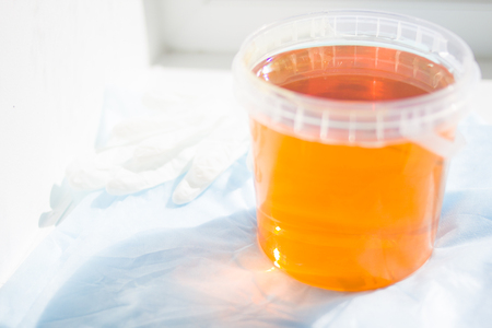 depilation and beauty concept - sugar paste or wax honey for hair removing with free space for textの写真素材