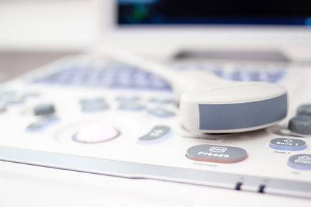 closeup ultrasound scanner equipment in clinic hospital. Diagnostics, sonography and health concept. Copyspaceの写真素材