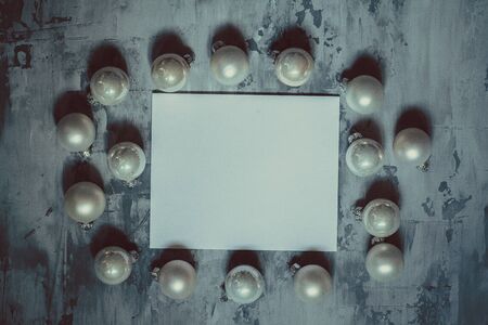 gray background concrete background with Christmas balls, a place for an inscription. the concept of Christmas and New Year,の写真素材