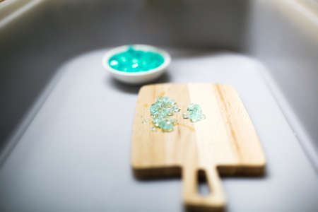 Spa still life with soap and sea salt on a white backgroundの写真素材