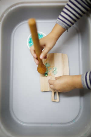 Children's hands in the bath. Selective focus. Kid.の写真素材