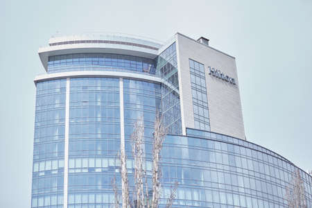 Kyiv, Ukraine: 24,04: Hotel Hilton on sunny sky background. Modern building. High quality photoのeditorial素材