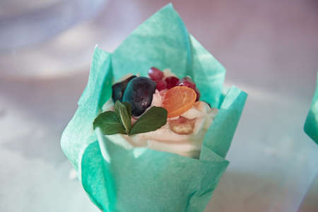 Wrapped fruit and mint cakes, an alternative to birthday cake. Sugar free. Top view. Copy space....
