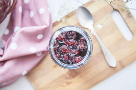 Anti-viral food concept. Healthy fermenting honey process with cranberry. Food preservative at home,...