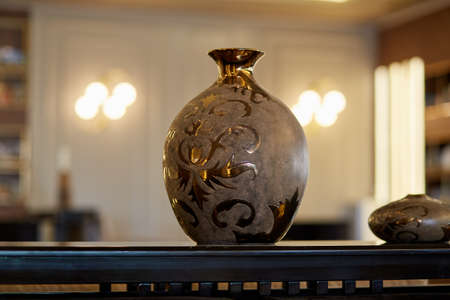 Modern interior with lamps, vase and blurred copy space. high quality photoの写真素材