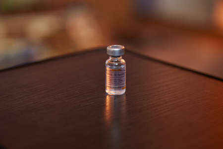 Kyiv, Ukraine - June 26, 2021: CoronaVac vaccine. Vaccinations during coronavirus. Vaccine bottles effective in preventing Covid-19 infections. Sinovac's vaccine CoronaVac (Sars-Cov-2). High quality photoのeditorial素材