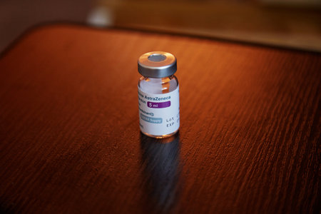 Kyiv, Ukraine - June 26, 2021: Astrazeneca vaccine. Vaccinations during coronavirus. Vaccine bottles...