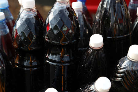 Homemade wine on the local market. Bottles mock up close up. High quality photo