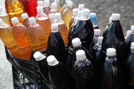 Homemade wine on the local market. Bottles mock up close up. High quality photo