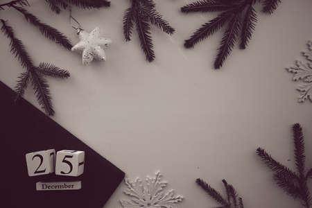 Black and white vintage retro card with date of Christmas, branches of fir tree. Merry Christmas...