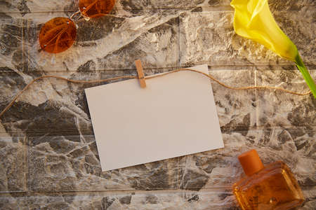 Aesthetic style of mock paper and stationery card for invitation or congratulations. Orange perfume...