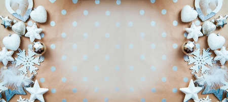 Christmas silver frame: ornaments background, basic classic pattern, place for text. Trendy decorations: disco balls, snowflakes, fluffy ornaments. Aesthetic festive atmosphere. Extra wide banner.の写真素材