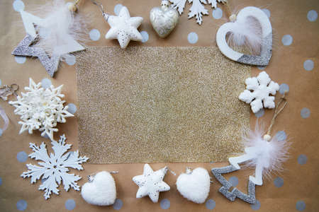 Christmas festive frame: ornaments - basic classic pattern, place for text background. Trendy decorations: fluffy ornaments, disco balls, snowflakes. Aesthetic festive atmosphere. View from above.の写真素材